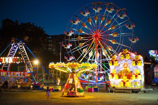 Night carousels in the summer in the old town of Nessebar Bulgaria.