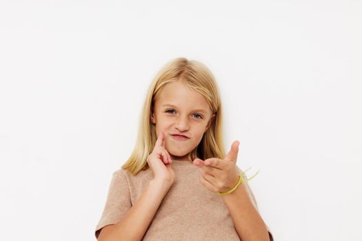 emotional girl gestures with his hands isolated background. High quality photo