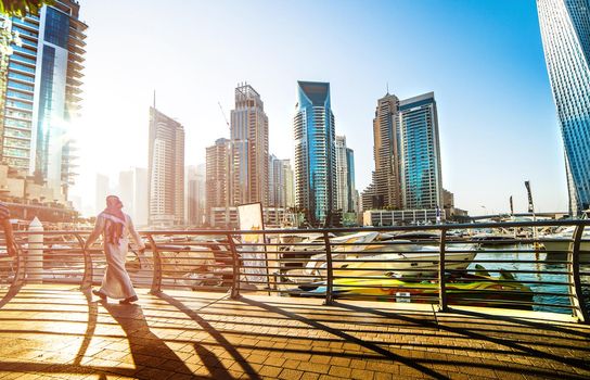 DUBAI, UAE -DECEMBER 14: Modern buildings in Dubai Marina, on december 14, 2013, Dubai, UAE. In the city of artificial channel length of 3 kilometers along the Persian Gulf.