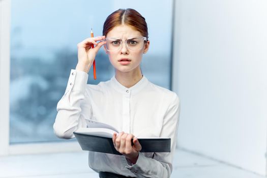 secretary with glasses with documents work official Professional. High quality photo