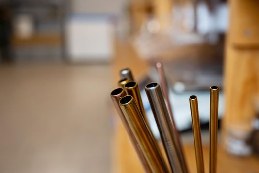Close-up of reusable steel tubes at an eco store.