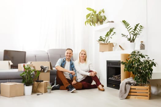 Happy young couple moving in new house