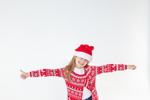 Cute funny santa's helper dancing on shiny background. Christmas holidays concept.