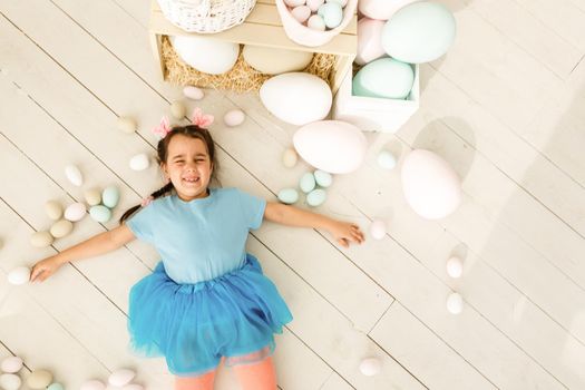 bunny ears and basket of Easter eggs