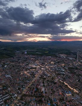 The cityscape of Turks Bagua City in China at dusk. Shot in Xinjiang, China.