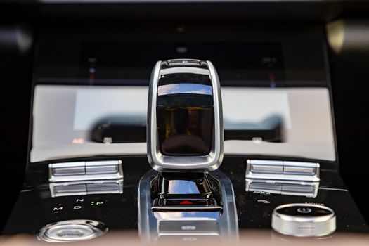 close-up of an automatic transmission Gearstick of a modern premium car. no people. interior of a premium car