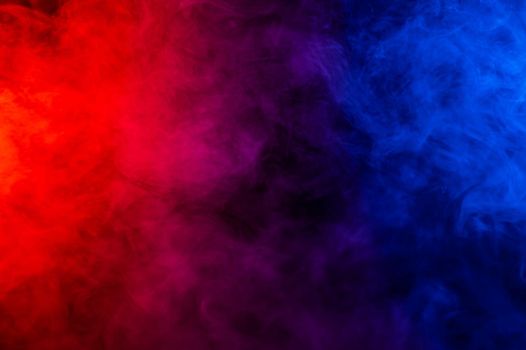 Fog in red blue neon light on black background