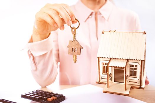 rental housing, realtor holds the key to the house.