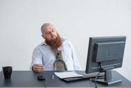 Problems for the office worker. A bald man in a white shirt sits at a desk with a computer and is stressed because of failure. A nervous breakdown