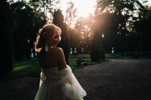 Silhouette of The lonely bride in the vintage At sunset.