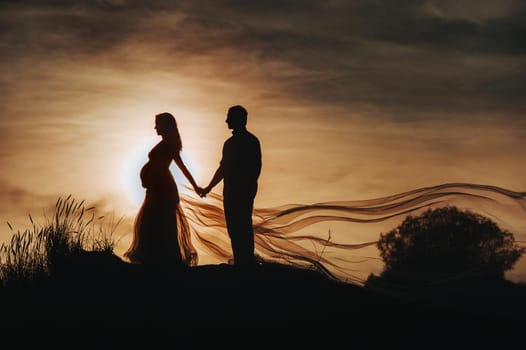 Loving man hugs a pregnant woman at sunset, against the backdrop of the sea, river, standing on the pier. Portrait of beautiful newlyweds expecting a baby. Photography, concept.