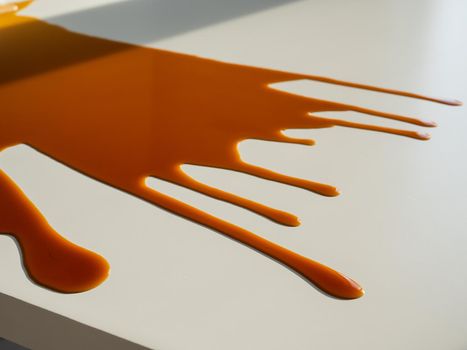 Cup of black coffee spilled on white work table