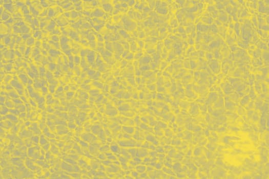 yellow colored texture of water in swimming pool. top view