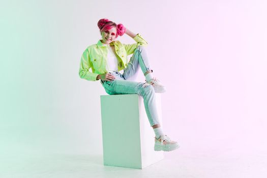 fashionable woman with pink hair creative studio model. High quality photo