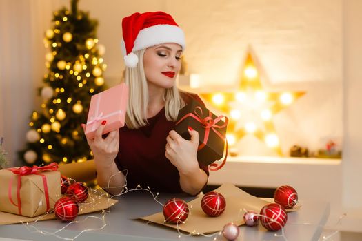 Portrait of a young woman during preparations for Christmas at home