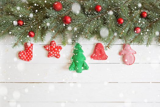 Christmas decoration on white old grunge wooden board.