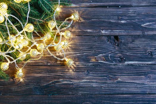 Christmas fir tree on wooden board background .