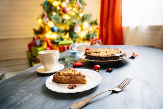 Panforte di Siena, Italian Christmas treat Gluten free christmas nut cake on a gray table with christmas decorations .