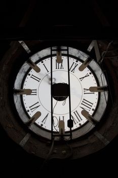 Old wall clock - mechanism inside, close up, vertical