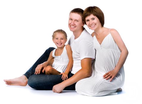Young family with a child on a white background