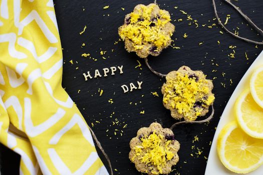 lemon cupcakes with colorful cloth - inscription happy day