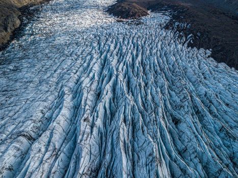 Svnafellsjkull Glacier in Iceland. Top view. Skaftafell National Park. Ice and ashes of the volcano texture landscape, beautiful nature ice background from Iceland