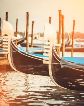 beautiful gondolas in a canal in Venice, Italy