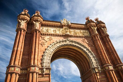 Beautiful Triumphal Arch of Barcelona against blue sky