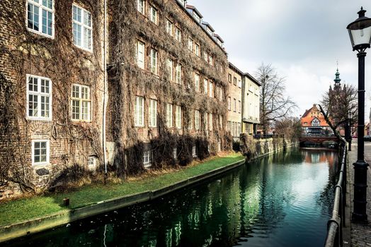 canal and old historic buildings in the old town of Gdansk, Poland