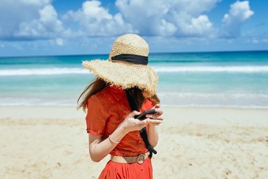 woman on the island beach ocean fresh air sand. High quality photo