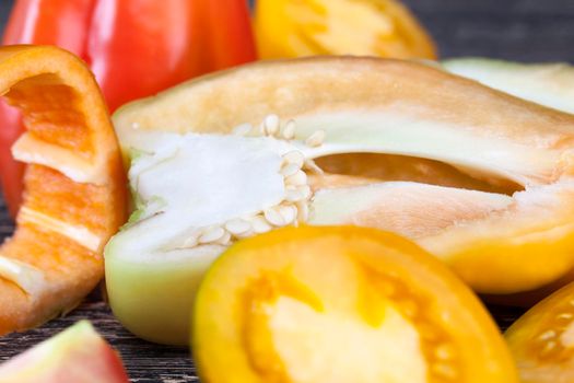 half-sliced peppers in the kitchen, cooking snacks and pepper salad