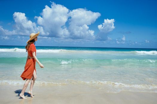 woman on the island beach ocean fresh air sand. High quality photo