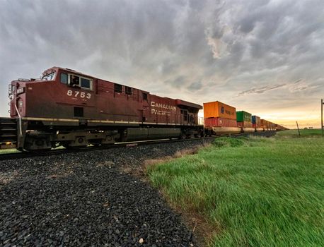 Prairie Storm Clouds in Saskatchewan Train Foreground