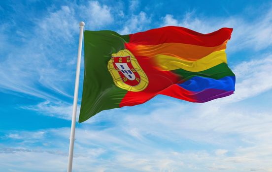 national lgbt flag of Portugal flag waving in the wind at cloudy sky. Freedom and love concept. Pride month. activism, community and freedom Concept. Copy space. 3d illustration