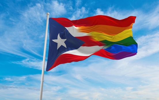 national lgbt flag of Puerto Rico flag waving in the wind at cloudy sky. Freedom and love concept. Pride month. activism, community and freedom Concept. Copy space. 3d illustration