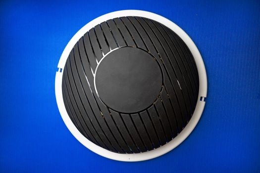 Bosu modern gym ball on blue mat top view photo