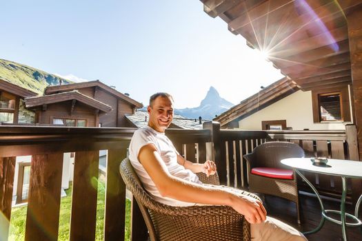 Sunny summer morning in Zermatt village with Matterhorn peak on backgroud. Beautiful outdoor scene in Swiss Alps, Switzerland, Europe.