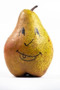 A large pear with a painted smiley face on a white isolated background.