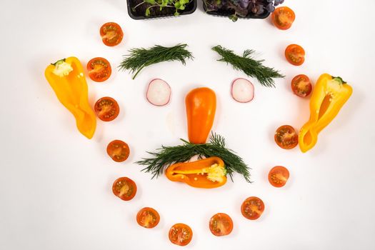 A person's face made of vegetables on a white background.