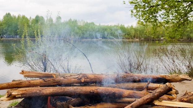 Beautiful red fire from wood. Flames fires preparation for cooking barbecue. Brazier on nature bbq.