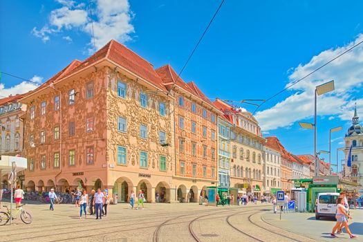 Graz - June 2020, Austria: View of the city center of Graz with tram lines, tram station and beautiful old buildings in the traditional architectural style