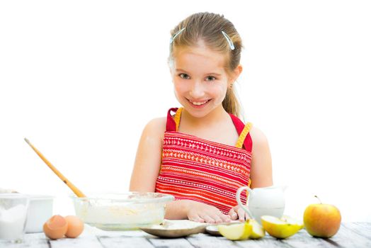 cute llittle girl cooking, on a white background