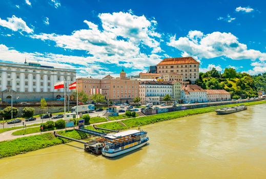 Linz - June 2020, Austria: Cityscape of Linz with Linzer Castle, colorful historical buildings and the Danube river