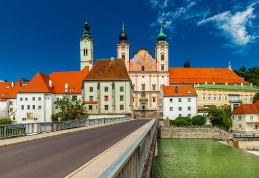 View of the St. Michael's Church and the Zwischenbrucken bridge in the city of Steyr, Austria