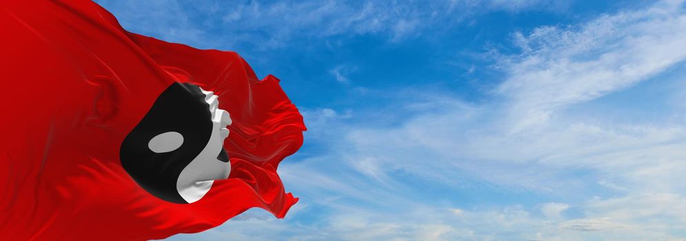 flag of Yinyang ren waving in the wind at cloudy sky. Freedom and love concept. Pride month. activism, community and freedom Concept. Copy space. 3d illustration