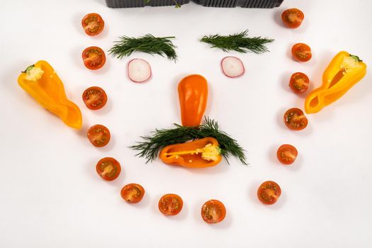 A person's face made of vegetables on a white background.