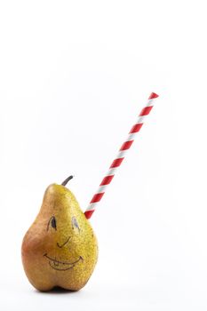 A large pear with a drinking tube sticking out of it on a white background.