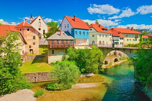 View of the Capuchin Bridge over the Selška Sora River in the old city center of Škofja Loka, Slovenia