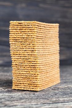 stacked together high thin crackers from rye bread, uses for food crispbread