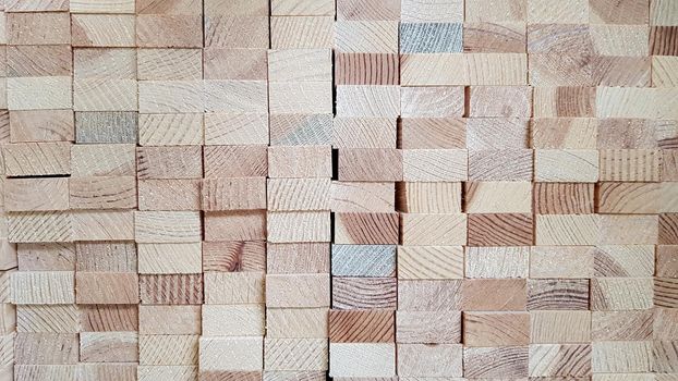 Wood texture background. Lumber industrial wood texture. End end made from machined wooden beam. Glued pine timber beams for wooden windows closeup.
